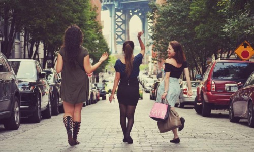 Find your perfect fit at The Edison a group of women walking down a street