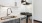 a kitchen with white cabinets