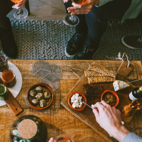 Vibrant community life with a variety of dining options group of people near table of food