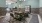 a large room with a table and chairs